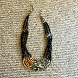 Beaded costume jewelry necklace appx 18.5” Black, brushed silver and gold
